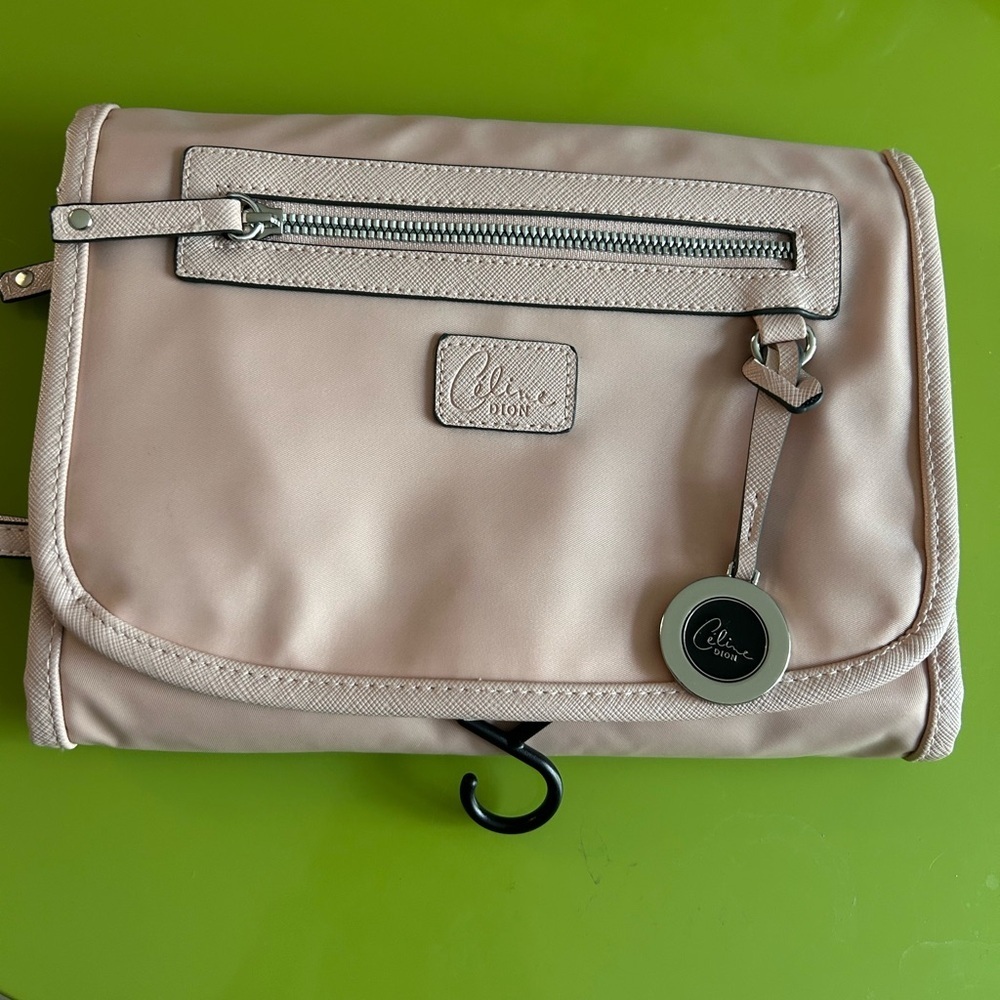 Pink Celine Dion travel cosmetic bag